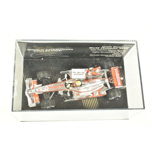 41 - EIGHT MINICHAMP 1.43 SCALE DIECAST MODELS, to include a a Vodafone McLaren Mercedes MP4-27 J Button ... 