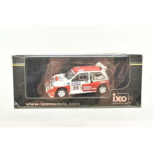 54 - SIX BOXED 1:43 SCALE DIECAST MODEL RACE CARS, to include an IXO MG Metro 6R4, model no. RAC116, an I... 