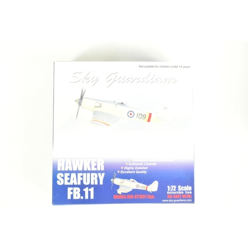 67 - EIGHT BOXED 1:72 SCALE SKY GUARDIANS HAWKER SEAFURY DIECAST MODEL AIRCRAFTS, the first a FB.11 WE683... 