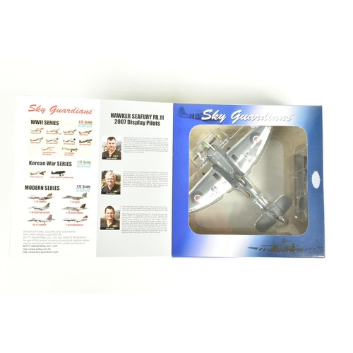 67 - EIGHT BOXED 1:72 SCALE SKY GUARDIANS HAWKER SEAFURY DIECAST MODEL AIRCRAFTS, the first a FB.11 WE683... 