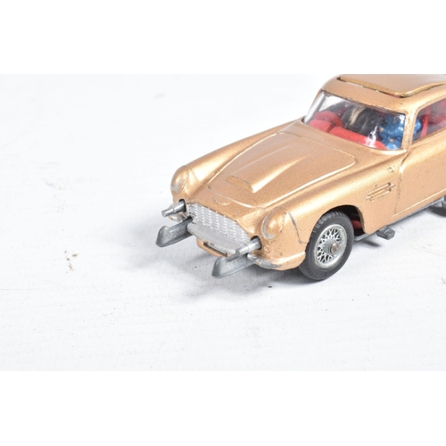 111 - A BOXED CORGI TOYS JAMES BOND ASTON MARTIN DB5, No.261, working features, very lightly playworn cond... 