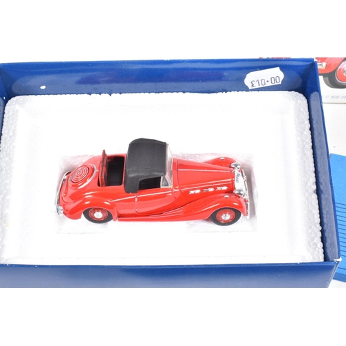 146 - AN INTERESTING  COLLECTION OF VARIOUS DIECAST TRIUMPH MODEL CARS, to include an unboxed 1:18 scale S... 