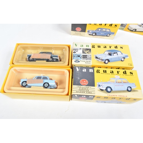 151 - FOURTEEN BOXED 1:43 SCALE DIECAST VANGUARDS TRIUMPH HERALD MODELS, to include a Grey, item no. 644VA... 