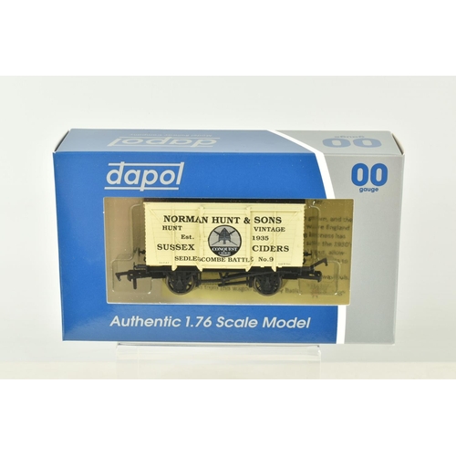 257 - TWELVE BOXED OO GAUGE DAPOL WAGONS AND TANKS, to include two Oakhill Brewery no. W2022, two Ashton G... 