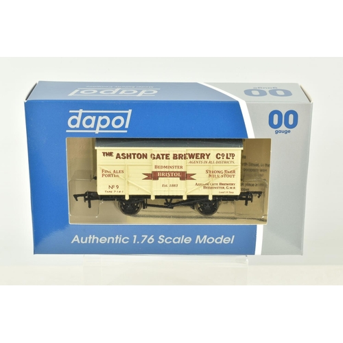 257 - TWELVE BOXED OO GAUGE DAPOL WAGONS AND TANKS, to include two Oakhill Brewery no. W2022, two Ashton G... 