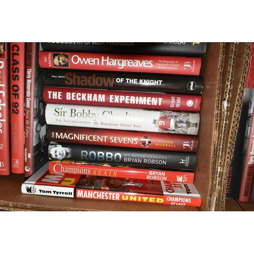 328 - MANCHESTER UNITED FOOTBALL CLUB INTEREST: TWO BOXES OF HARDBACK AND PAPERBACK BOOKS, approximately s... 