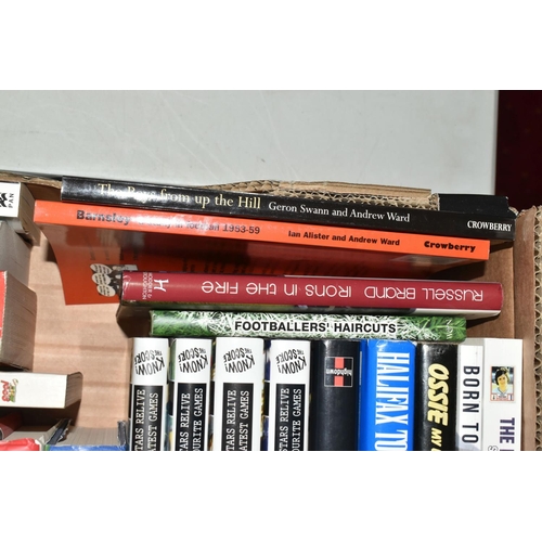 338 - THREE BOXES OF FOOTBALL INTEREST HARDBACK AND PAPERBACK BOOKS, approximately one hundred and three t... 