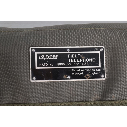 396 - TWO ROYAL MILITARY FIELD TELEPHONES IN CANVAS BAGS, these are British made, they are both PTC404 aco... 