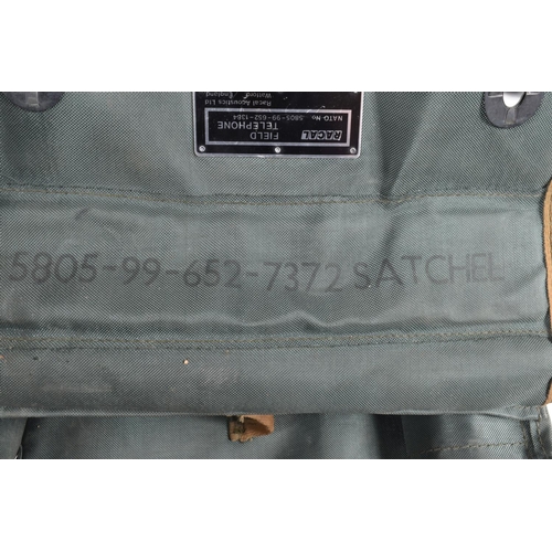 397 - THREE ROYAL MILITARY FIELD TELEPHONES IN CANVAS BAGS, these are British made, they are all PTC404 ac... 