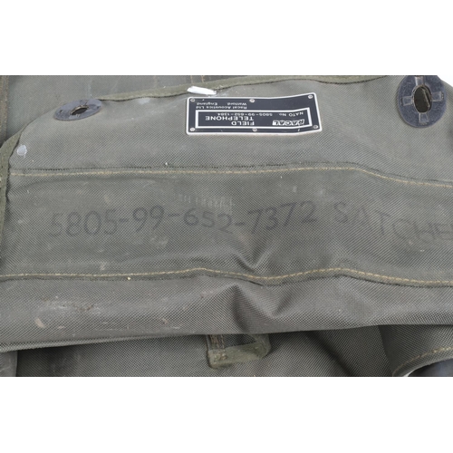 397 - THREE ROYAL MILITARY FIELD TELEPHONES IN CANVAS BAGS, these are British made, they are all PTC404 ac... 