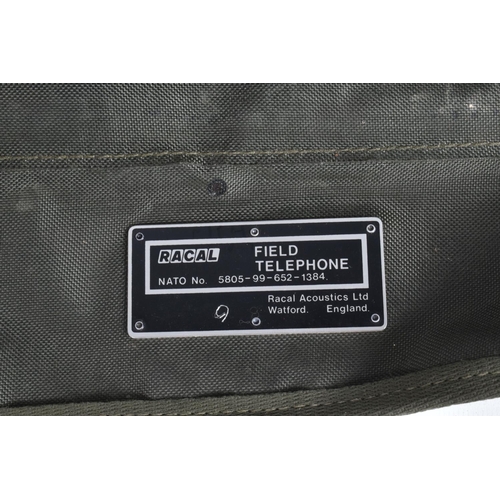 397 - THREE ROYAL MILITARY FIELD TELEPHONES IN CANVAS BAGS, these are British made, they are all PTC404 ac... 