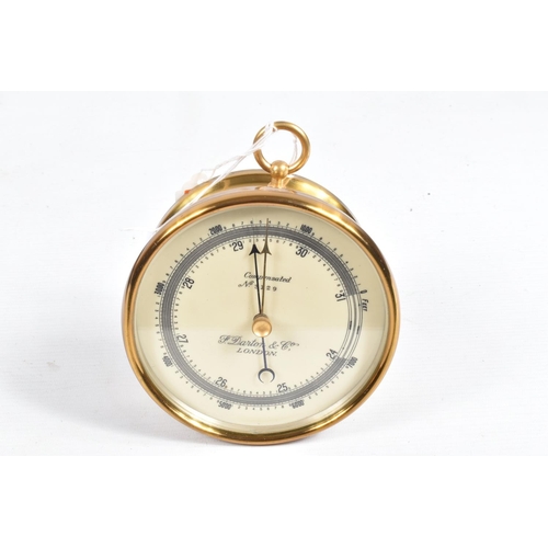 403 - A CASED COMPENSATED HANGING ANEROID BAROMETER, this is made of brass and has a white dial with black... 