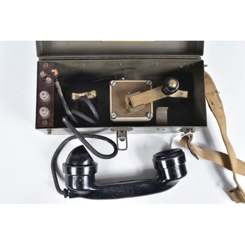 407 - TWO CASED FIELD TELEPHONES, both Patt. 13152, telephone MFG. Co. Ltd, London 1945, both include tele... 