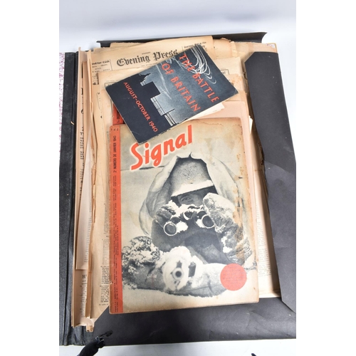 417 - A LARGE FOLDER CONTAINING A QUANTITY OF GERMAN POSTERS, magazines and newspapers, this includes edit... 