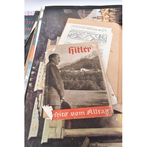 417 - A LARGE FOLDER CONTAINING A QUANTITY OF GERMAN POSTERS, magazines and newspapers, this includes edit... 