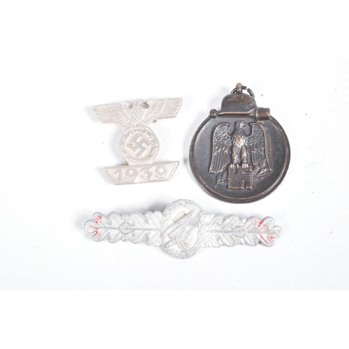 443 - A COLLECTION OF GERMAN BADGES, AWARDS AND EASTERN FRONT MEDAL, the awards include a Flak badge, make... 