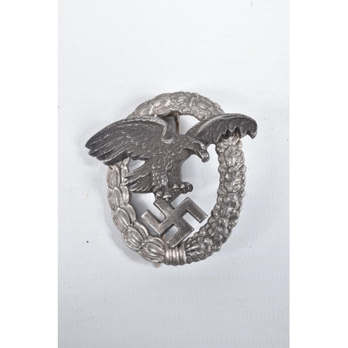 445 - THREE GERMAN BADGES, to include a Luftwaffe Flakbadge, Luftwaffe observers badge and an infantry gro... 