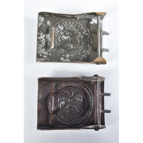 447 - FOUR GERMAN UNIFROM BELT BUCKLES, these include an Army NCO's buckle that has a hammered finish and ... 