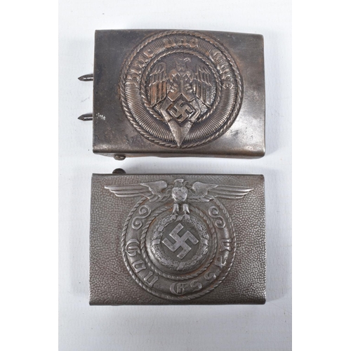 447 - FOUR GERMAN UNIFROM BELT BUCKLES, these include an Army NCO's buckle that has a hammered finish and ... 