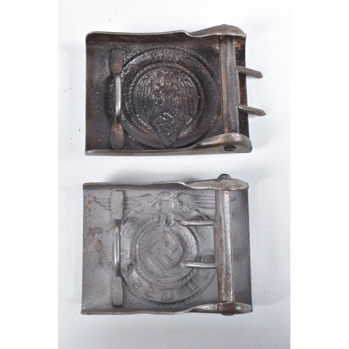 447 - FOUR GERMAN UNIFROM BELT BUCKLES, these include an Army NCO's buckle that has a hammered finish and ... 