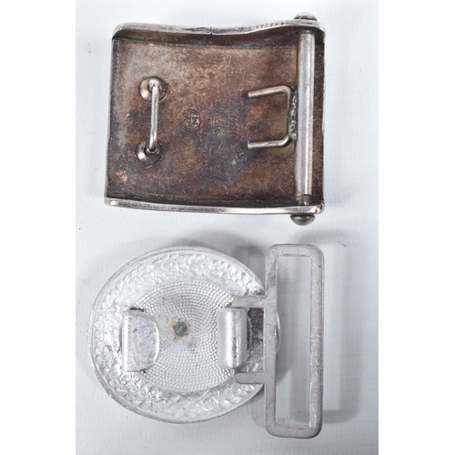 448 - FOUR GERMAN BELT BUCKLES, to include a steel buckle for enlistes men, the inside has a feint makers ... 