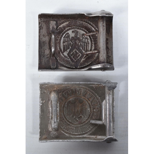 448 - FOUR GERMAN BELT BUCKLES, to include a steel buckle for enlistes men, the inside has a feint makers ... 