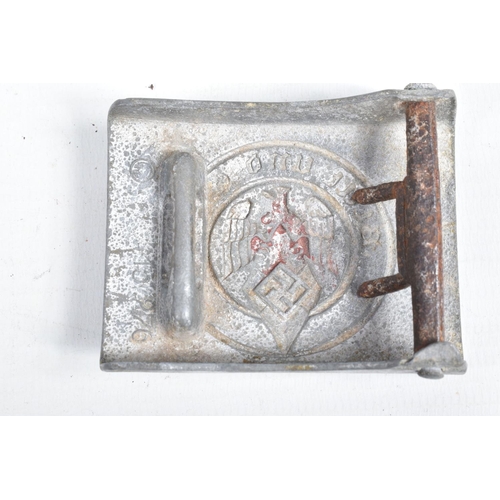 449 - THREE GERMAN BELT BUCKLES, to include a fire/police buckle with a hamemred finish to the front, a HJ... 