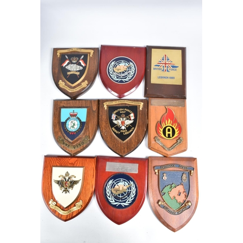 456 - A QUANTITY OF MILITARY WOODEN COMMEMORATIVE WALL PLAQUES, these include united nations, Northumberla... 