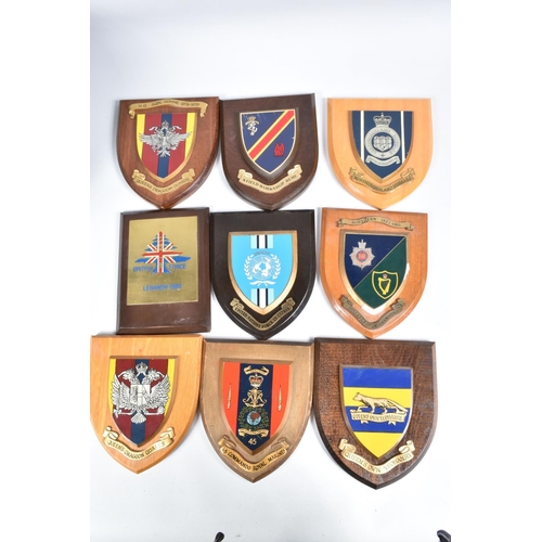 456 - A QUANTITY OF MILITARY WOODEN COMMEMORATIVE WALL PLAQUES, these include united nations, Northumberla... 