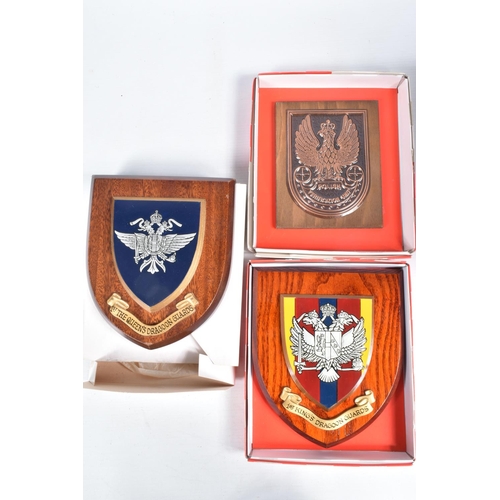 456 - A QUANTITY OF MILITARY WOODEN COMMEMORATIVE WALL PLAQUES, these include united nations, Northumberla... 