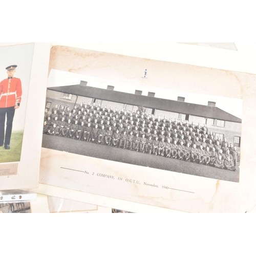 463 - A LARGE ASSORTMENT OF MILITARIA, to include hats, uniform, prints, posters, this lot includes a fema... 