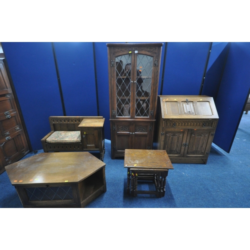 1204 - A SELECTION OF 20TH CENTURY OAK FURNITURE, to include an Old Charm corner cupboard, with double lead... 