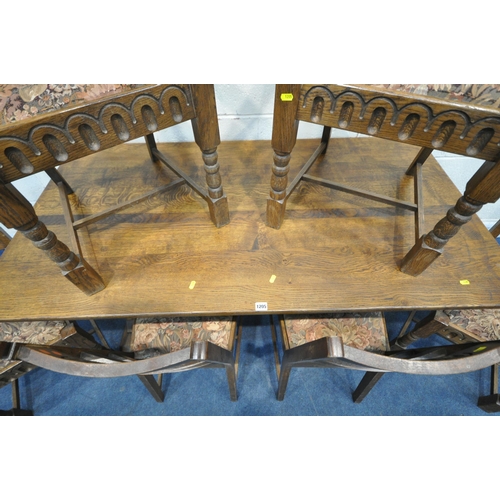 1205 - A 20TH CENTURY OAK DINING TABLE, on trestle style legs, united by a stretcher, length 152cm x depth ... 