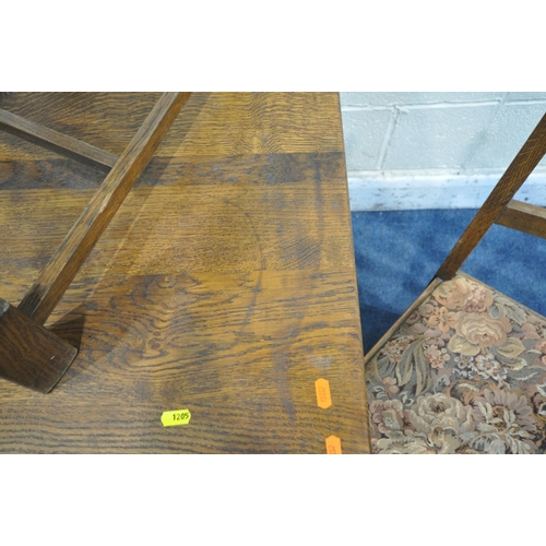 1205 - A 20TH CENTURY OAK DINING TABLE, on trestle style legs, united by a stretcher, length 152cm x depth ... 