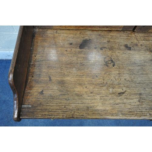 1209 - A LATE 19TH / EARLY 20TH CENTURY OAK SIDE TABLE, with a raised gallery back, three frieze drawers, o... 