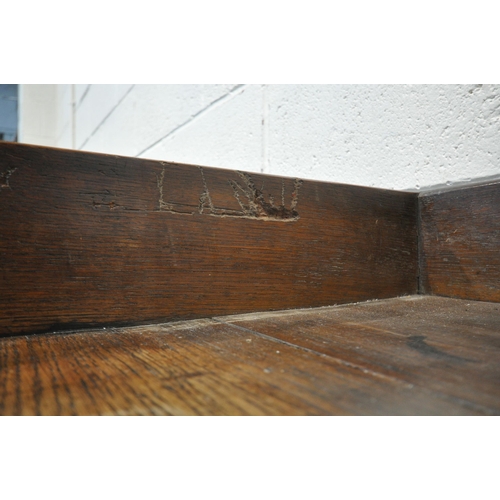 1209 - A LATE 19TH / EARLY 20TH CENTURY OAK SIDE TABLE, with a raised gallery back, three frieze drawers, o... 