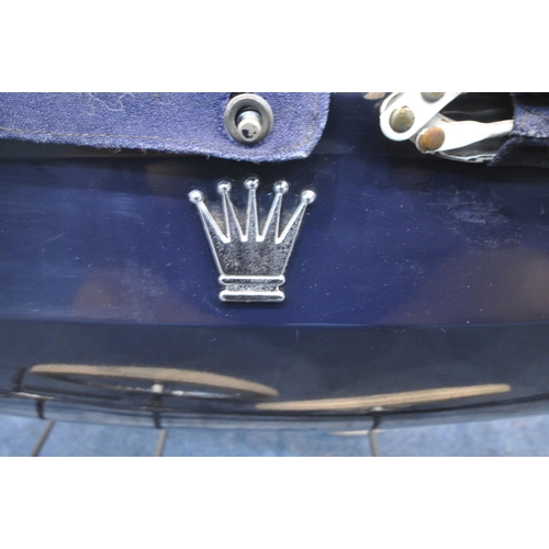 1210 - A DARK BLUE VINTAGE SILVER CROSS STYLE CHILDS PRAM, with a crown symbol to each side, along with a c... 