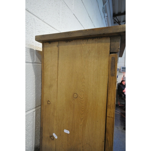 1214 - A 20TH CENTURY SLIM PINE SINGLE DOOR CUPBOARD, with two fixed shelves, width 57cm x depth 36cm x hei... 