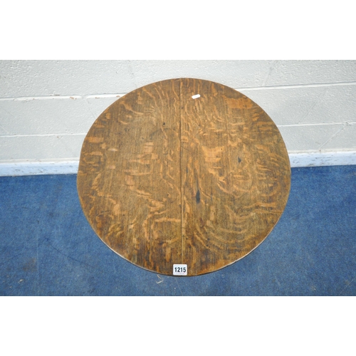 1215 - A GEORGIAN OAK CIRCULAR TRIPOD TABLE, diameter 59cm x height 69cm (condition report: all legs cut do... 