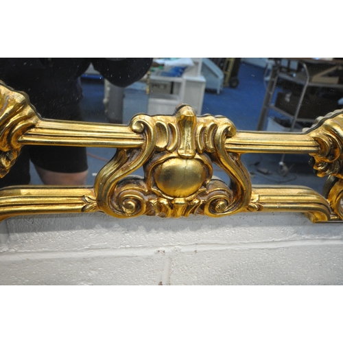 1221 - A GILT RESIN SERPENTINE CONSOLE TABLE, with foliate apron, on cabriole legs with wavy detail, width ... 