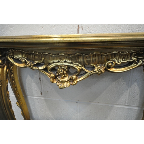 1221 - A GILT RESIN SERPENTINE CONSOLE TABLE, with foliate apron, on cabriole legs with wavy detail, width ... 