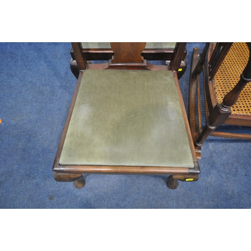 1241 - A 20TH CENTURY CANE SEATED ROCKING CHAIR, with green upholstered head rest, and geometric ladderback... 