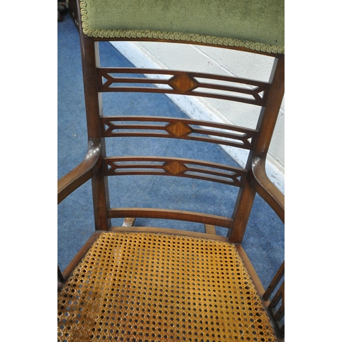 1241 - A 20TH CENTURY CANE SEATED ROCKING CHAIR, with green upholstered head rest, and geometric ladderback... 