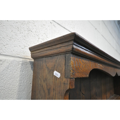 1247 - A GOOD QUALITY REPRODUCTION OAK DRESSER, the top two tier plate rack, on a base with two drawers and... 