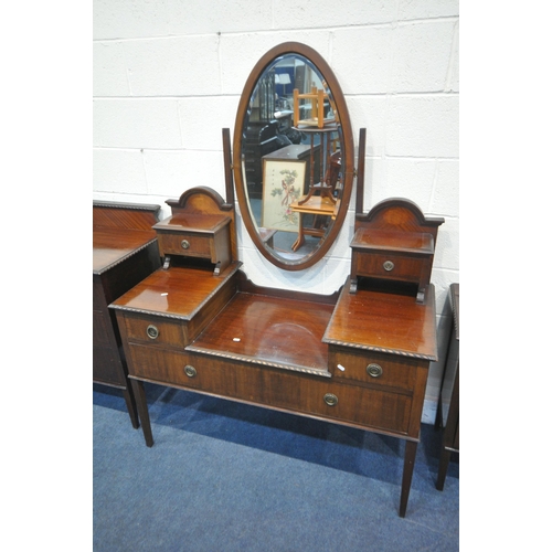 1251 - A 20TH CENTURY MAHOGANY TWO PIECE BEDROOM SUITE, comprising a dressing table, with an oval mirror, f... 