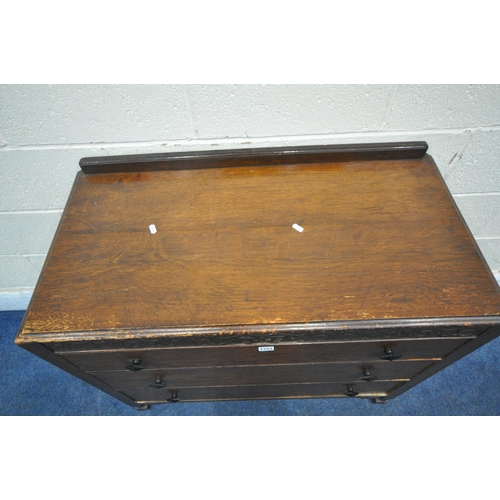 1252 - A 20TH CENTURY OAK CHEST OF THREE LONG DRAWERS, with a raised back, on turned and block legs, width ... 