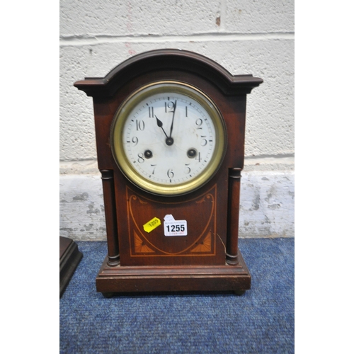 1255 - TWO 20TH CENTURY MAHOGANY MANTEL CLOCKS, the taller clock with winding key and pendulum, the other w... 