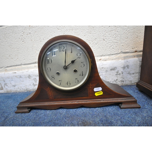 1255 - TWO 20TH CENTURY MAHOGANY MANTEL CLOCKS, the taller clock with winding key and pendulum, the other w... 