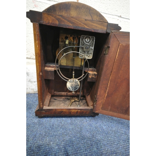 1255 - TWO 20TH CENTURY MAHOGANY MANTEL CLOCKS, the taller clock with winding key and pendulum, the other w... 