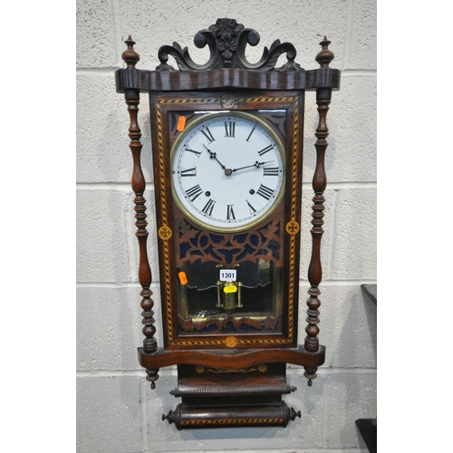 1301 - A 19TH CENTURY ROSEWOOD AND MARQUETRY INLAID WALL CLOCK, with turned spindles, flanking a glazed doo... 